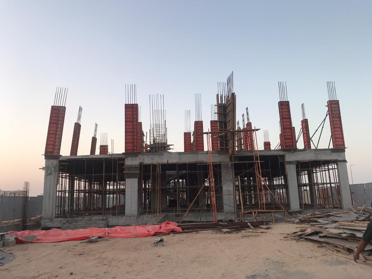 Two-storey villa structure at dusk in Baniyas.