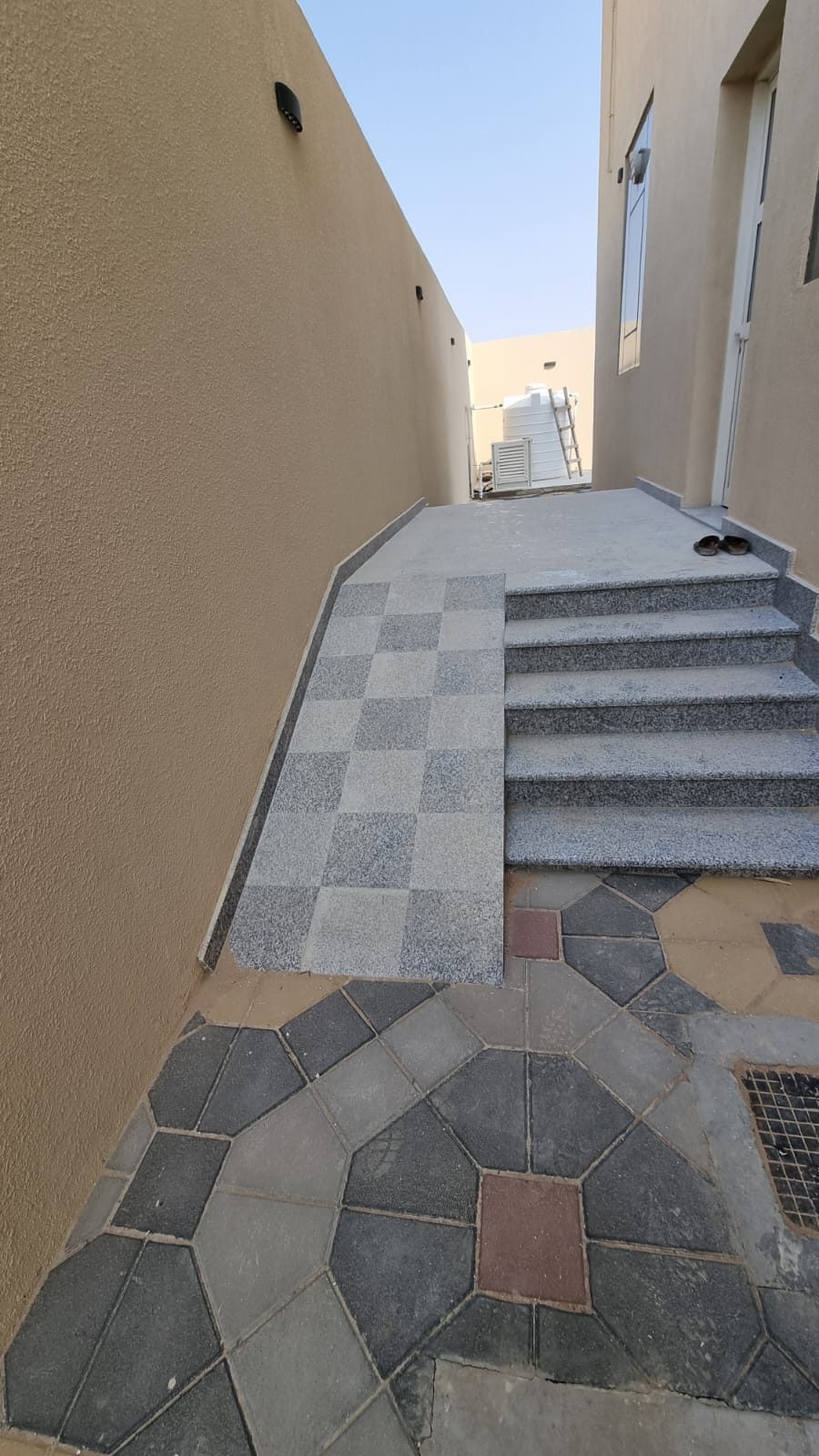 Inlaid marble floor medallion, polished on site.