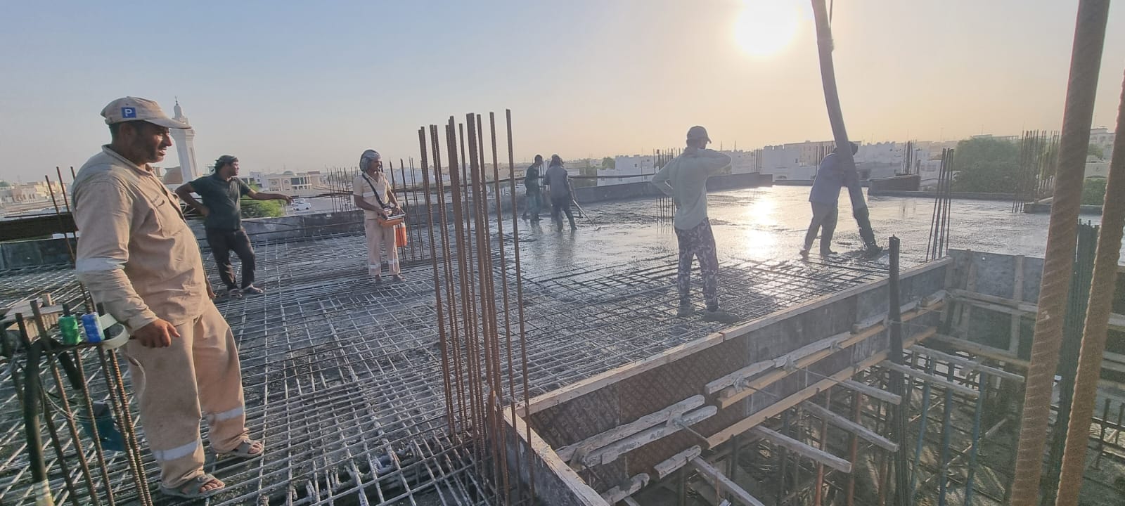 Slab pour at sunset, Al Samha.