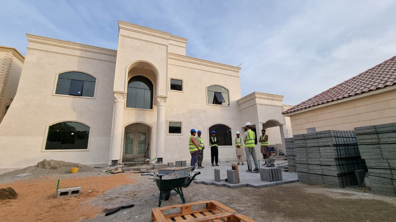 Build Marque crew on site at a completed villa, Al Rahba